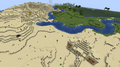 A pre-village & pillage desert village, with a partially buried desert temple.