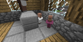 A Priest villager child and a Librarian villager child.