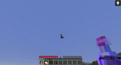 A player avoiding a phantom by using the Invisibility effect.
