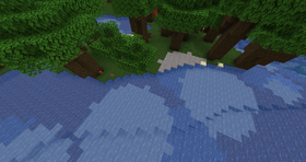 A dark forest that is cut off by water.