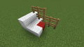 Mobs can jump onto this fence because of the red block. Remove the red block or replace the adjacent fence with a solid block.