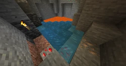 A water flowing on lava lake, creating obsidian. The water was placed by a player.