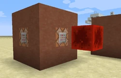 Command blocks in a terracotta cube.