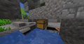 A chest located in an ocean ruins building, that is hidden by a block, viewed in Spectator mode.