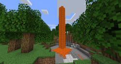A dirt tower covered in lava.