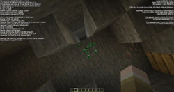 A block of emerald ore found in a plains biome.