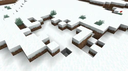 A snow-covered tundra erosion.