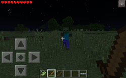 A screenshot including zombies and the Pocket Edition health bar