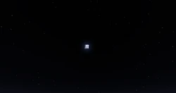 La luna llena y las estrellas en el cielo nocturno.