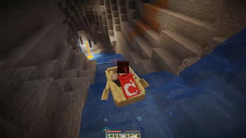 A player boating inside of a cave, showcasing a subterranean water feature.