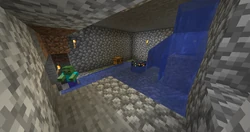 A monster room that has become flooded because of falling sand on the bottom of a river.
