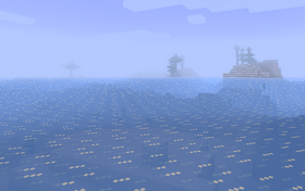 A frozen ocean biome, with fog obscuring the distance.