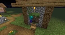 A group of zombies, two of which are villagers, breaking down a wooden door.