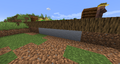 Some clay that naturally spawned in a lake but replaced the dirt under a village farm.