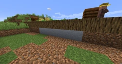 Some clay that naturally spawned in a lake but replaced the dirt under a village farm.