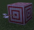 An arrow at the center of a target block