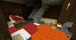 Entrance to the mansion with a lava lake and a small pond.