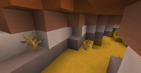 A cave in a badlands biome.
