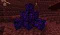 Un tas d'obsidienne pleureuse placé dans le Nether.