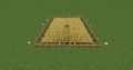 A simple wheat farm with a fence surrounding it to protect it from mobs, and a fence gate for access.