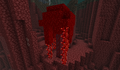 A huge crimson fungus generated on netherrack.