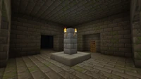 A pillar room in a stronghold, intersecting with other tunnels, notice that one of them is a dead end.