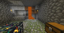 A monster room with lava spilling into it from a spring.