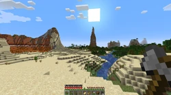A desert with an interesting mountain in the distance.