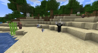 An evoker looks on as its vexes lunge toward its enemy.