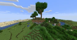 A floating island in a forest biome with a few trees growing on it.