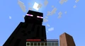 As long as user's cursor does not land on an enderman's torso, a user can get fairly close to the enderman without damage.
