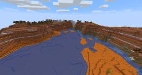 A badlands biome with a small lake nearby. A wooded variant can be seen in the upper corner.