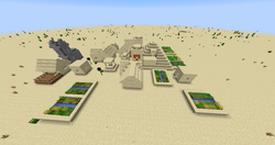 Zombie village next to a desert temple.png