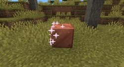 Removing wax from a copper block.