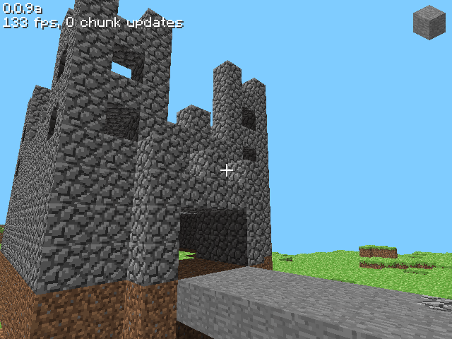 Remade a castle I built in minecraft classic! Second photo is the