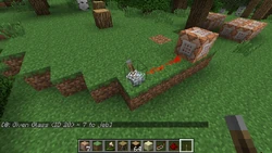 The second image released by jeb_ showing the block giving glass to the player.