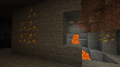 Gold ore blocks in a cave.