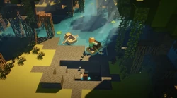 Steve and Alex digging a hole in a swamp.