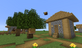 A naturally generated bee nest in a Superflat village.