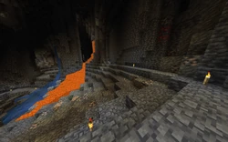 Vein of deepslate iron ore with some raw iron blocks.