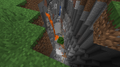 A tree that generated in a canyon, next to the lava and mineshaft.