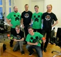 Mojang's employees, in their Minecraft suits.