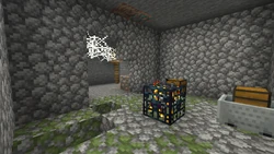 A monster room that spawned intersecting a mineshaft, where one of the chests has been replaced with a minecart chest.