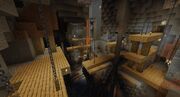A 1.17 Mineshaft with ceiling supports and oak log supports from the ground