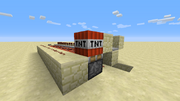 Piston TNT cannon