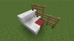 Mobs kunnen op het hek komen door het rode blok. Als het rode blok wordt verwijderd of het hek dat ernaast staat weggehaald wordt, kunnen mobs er niet meer overheen klimmen.