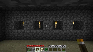 Шаг 3. Постройте 2 такие стенки, в каждое отверстие поставьте факел.