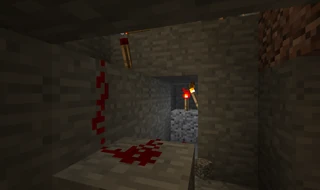 9. В тоннеле под воронкой устанавливаем красный факел так, чтобы между ним и воронкой был еще один непрозрачный блок. Красный провод подводим к блоку под факелом.