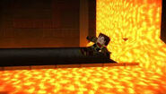 Jesse sliding under the falling lava.