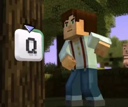 Male Jesse punching a tree.